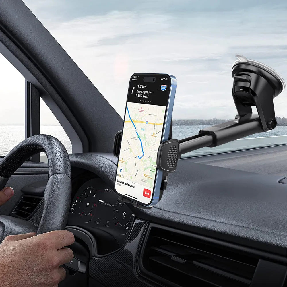 Black plastic universal car mobile phone bracket with suction mount on windscreen