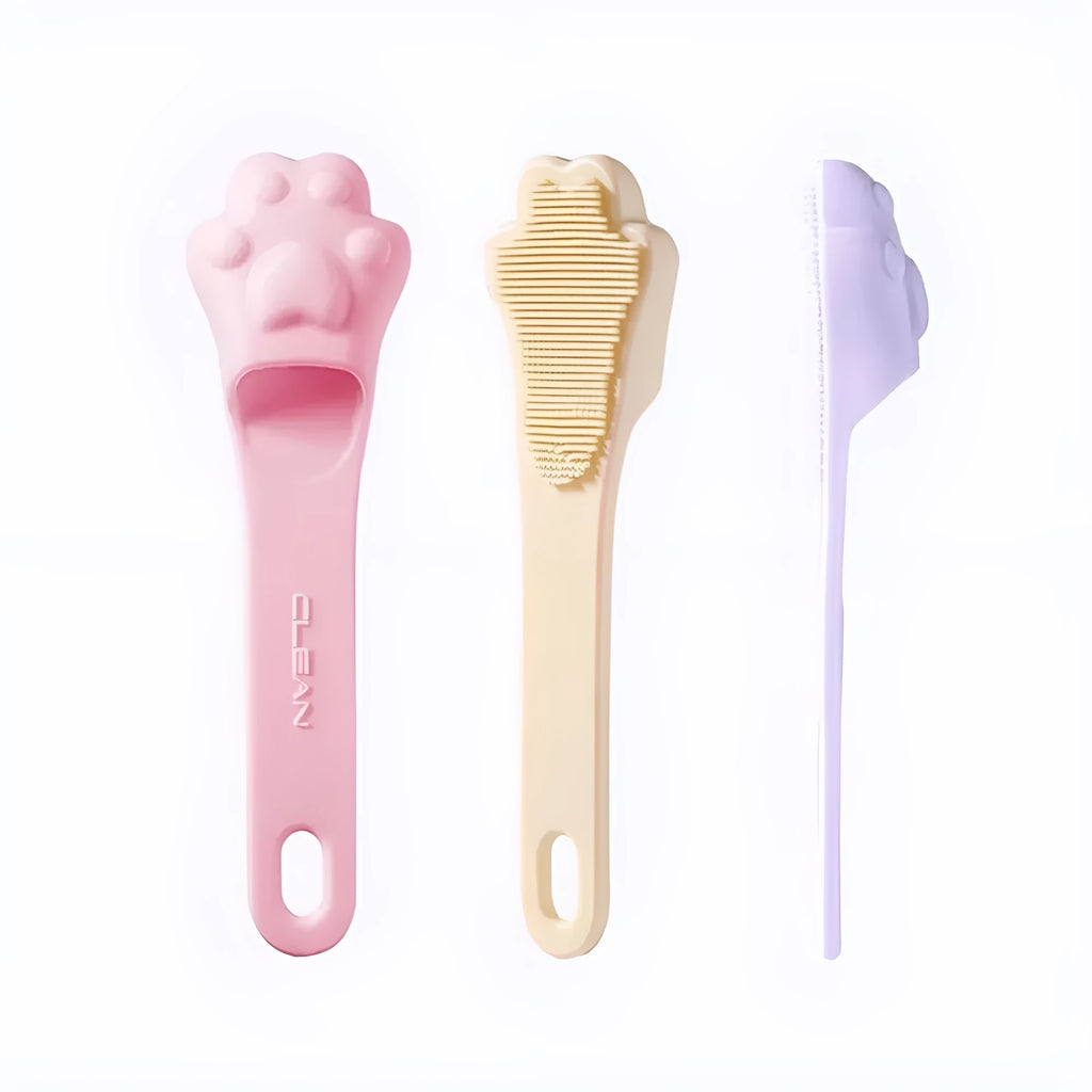 Silicone finger toothbrush for pets in pink, purple, and yellow colours
