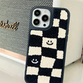 Black and white chessboard TPU phone case for iPhone with precise cutouts on a white background