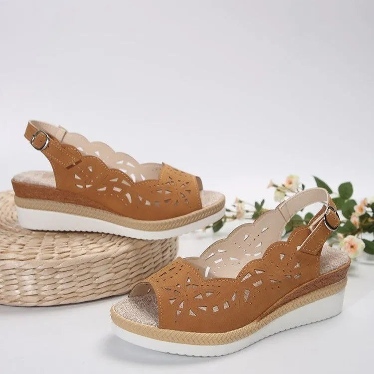 Women's fish-mouth wedge sandals in black with hollow buckle detail and thick PU sole