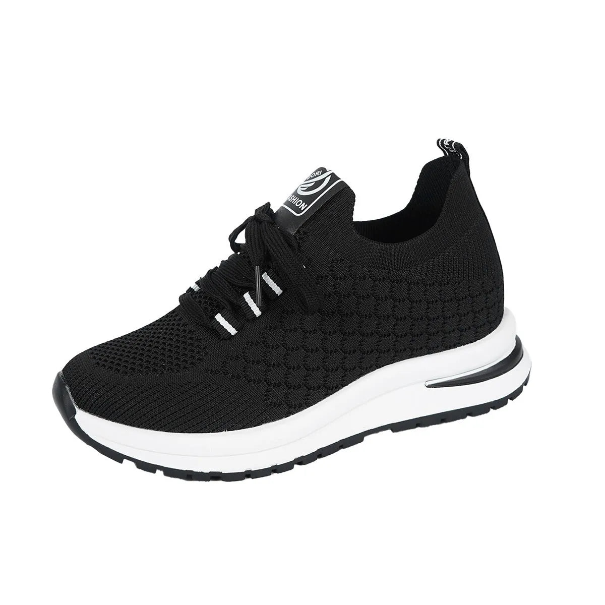 Women's black platform sneakers with mesh upper and lace-up front on flat rubber sole