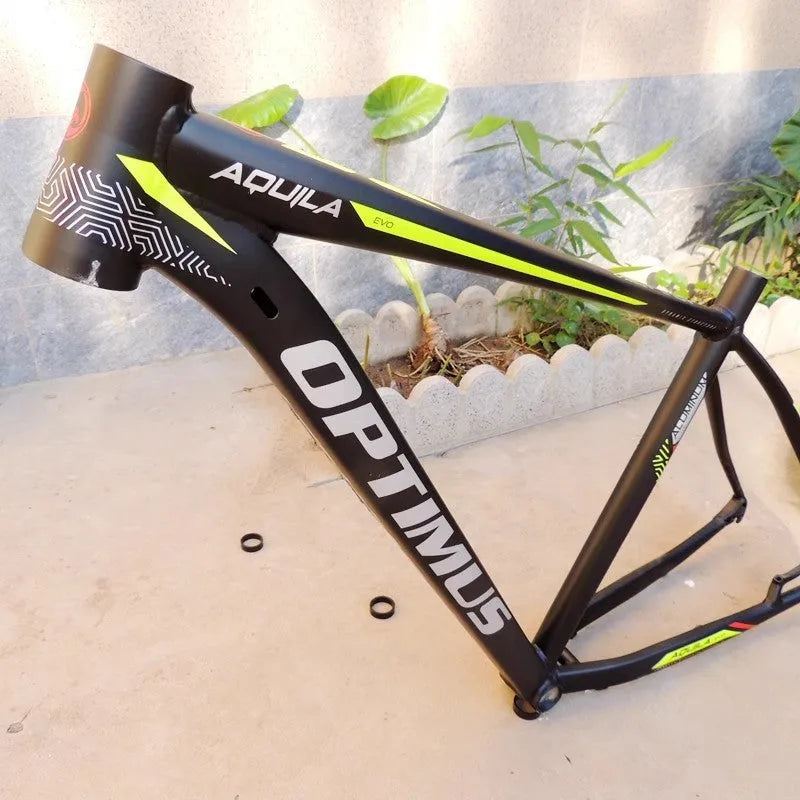Black green aluminium mountain bike frame for 29-inch wheels with internal cable routing ports