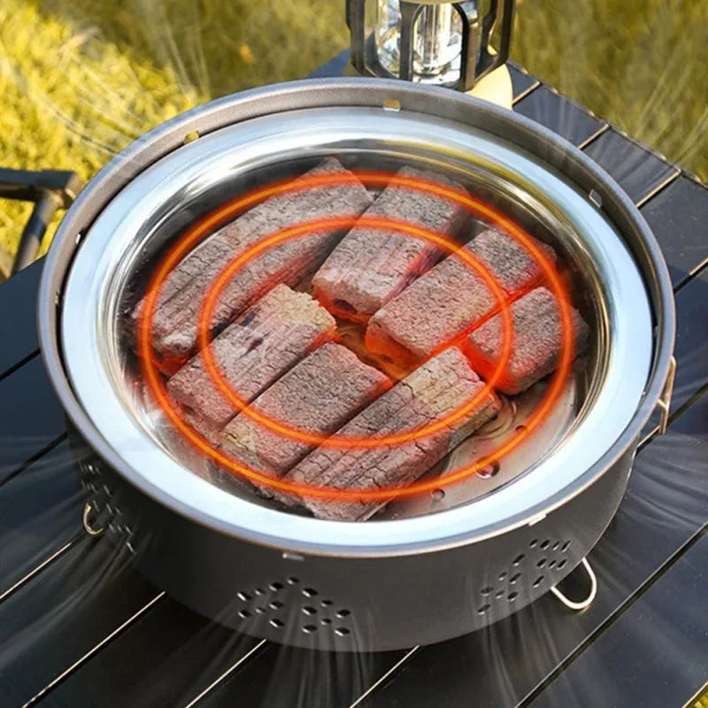 Portable stainless steel detachable BBQ grill with carry bag for outdoor camping.