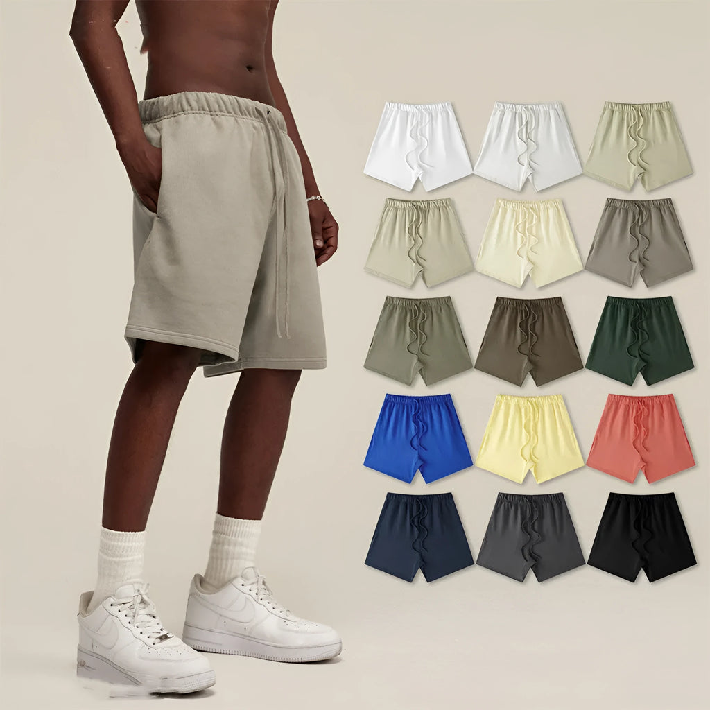 Men's cotton loose fit solid colour shorts in assorted colours like black, navy, and grey