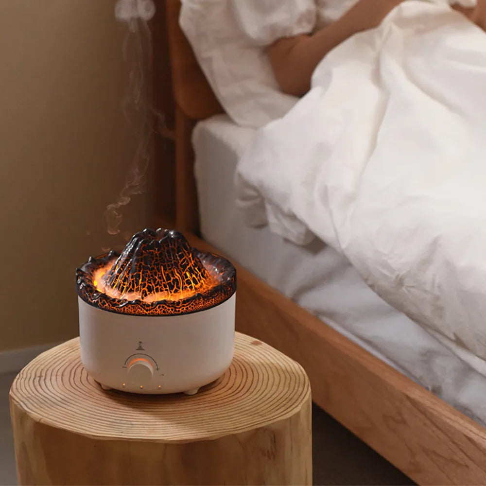White columnar volcanic humidifier with simulated flame lighting and remote control