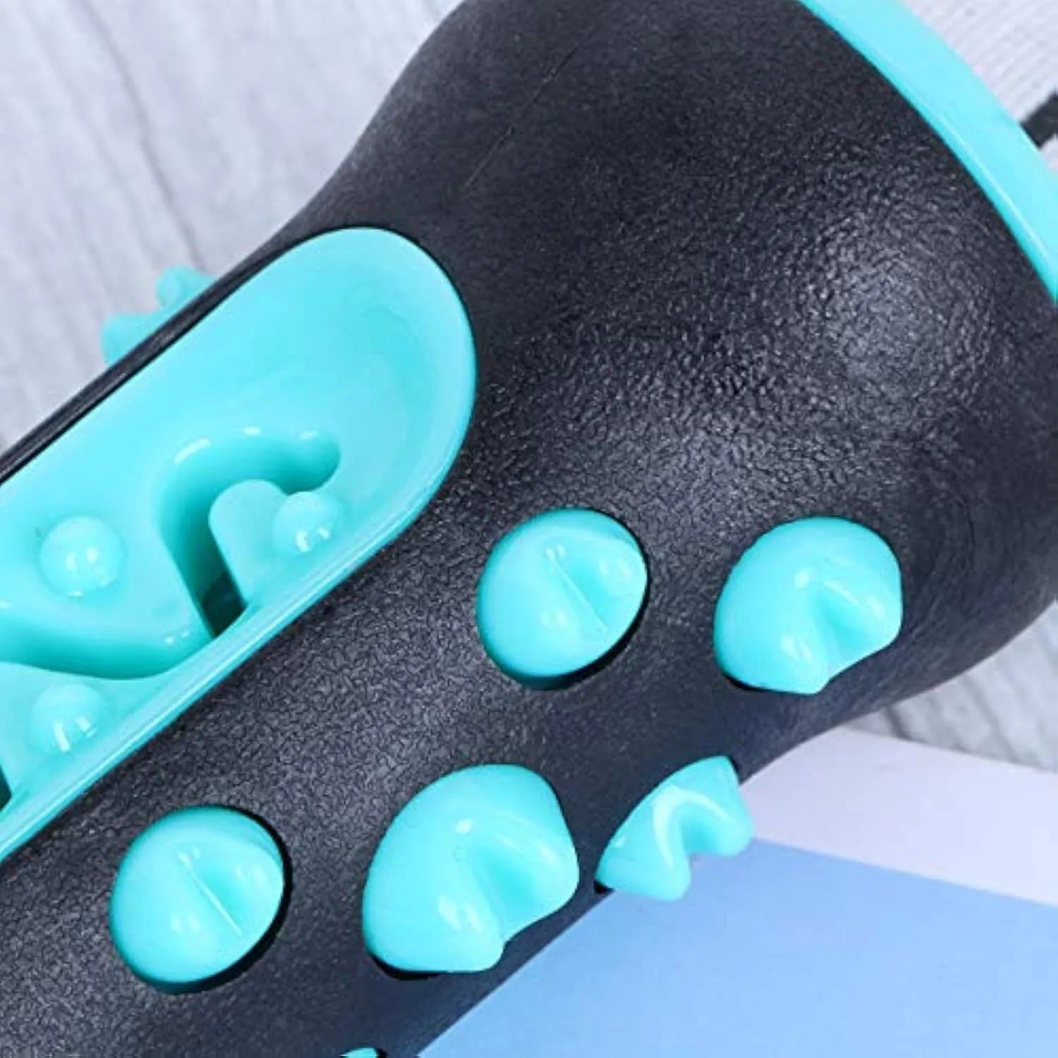 Natural rubber dog dental chew toy in blue, shown as a toothbrush-shaped stick for teeth cleaning.