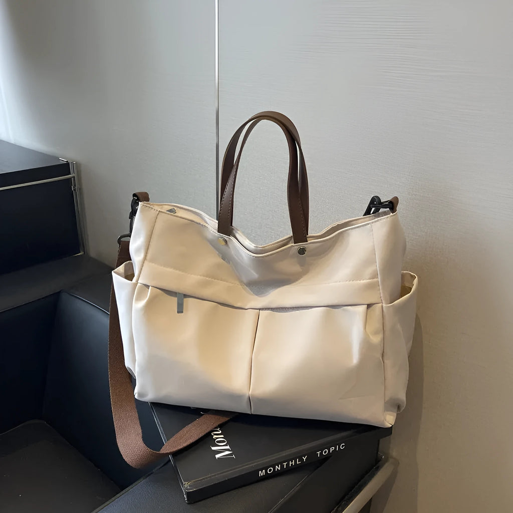 Nylon crossbody tote bag in black grey white green colours showing dimensions 39x28cm