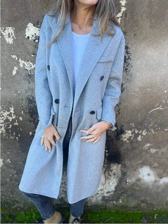 Women's mid-length double-breasted lapel jacket in solid colour polyester with long sleeves, loose fit version