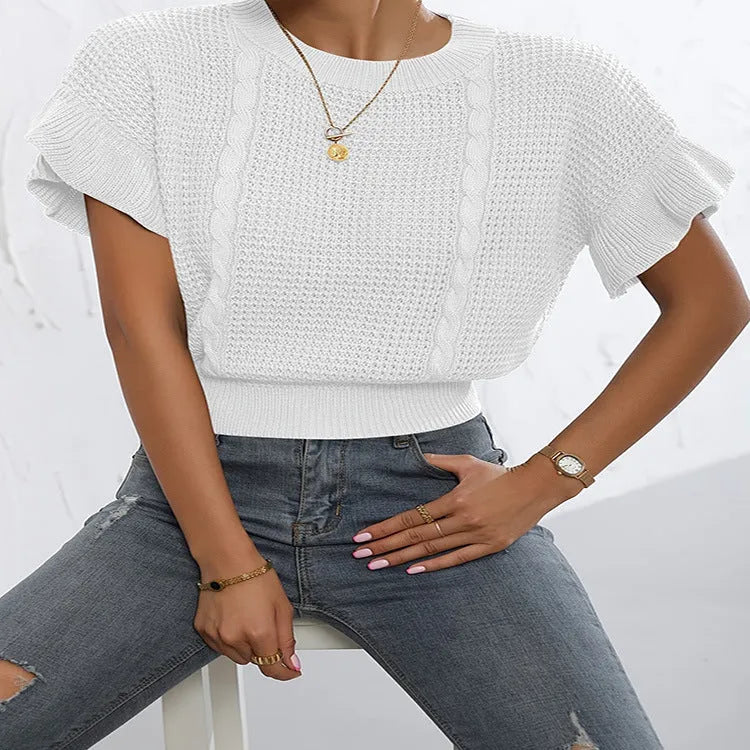 Knitted pullover sweater with ruffled short sleeves on a mannequin, shown in white colour.