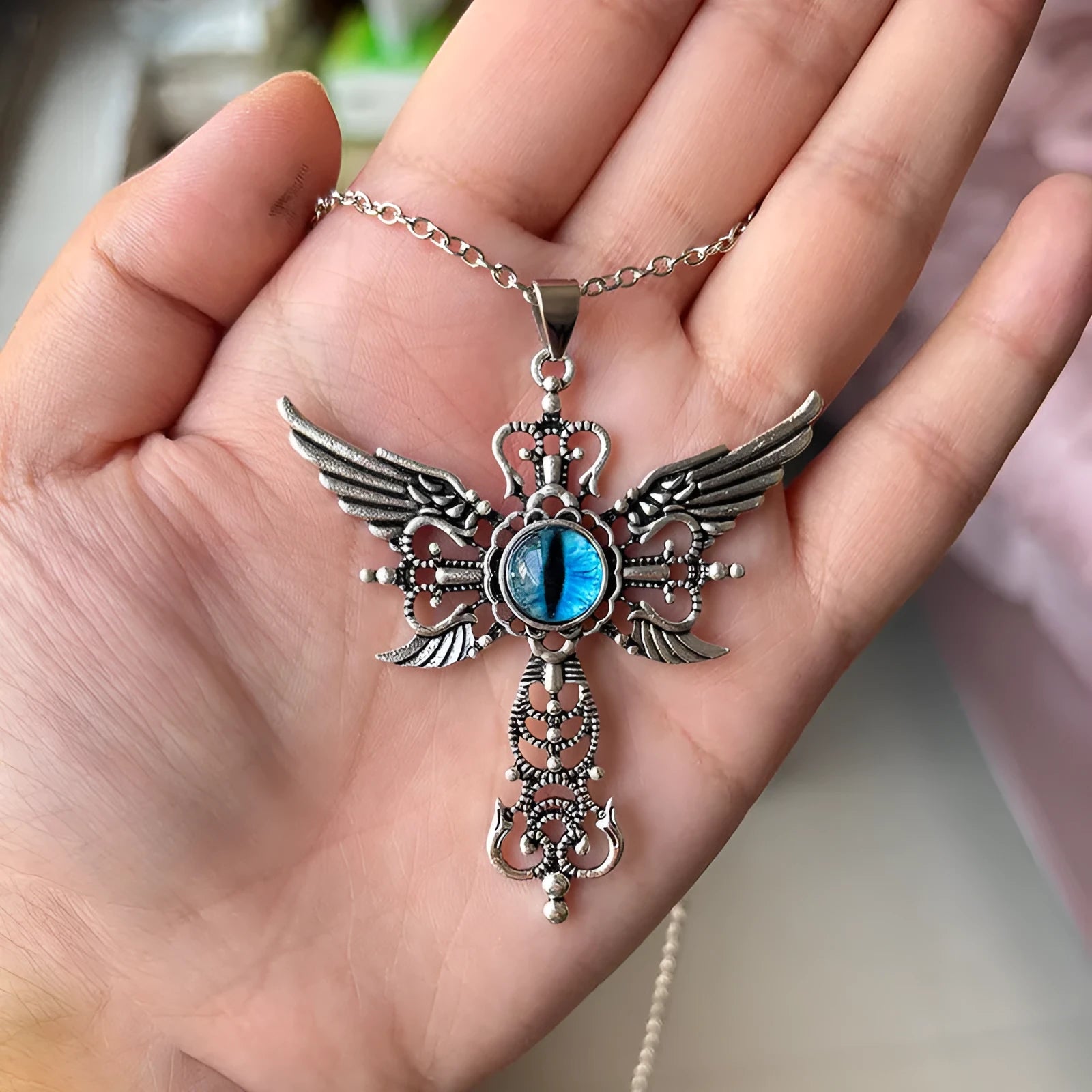 Creative devil wings and geometric cross pendant necklace in alloy on an adjustable chain.