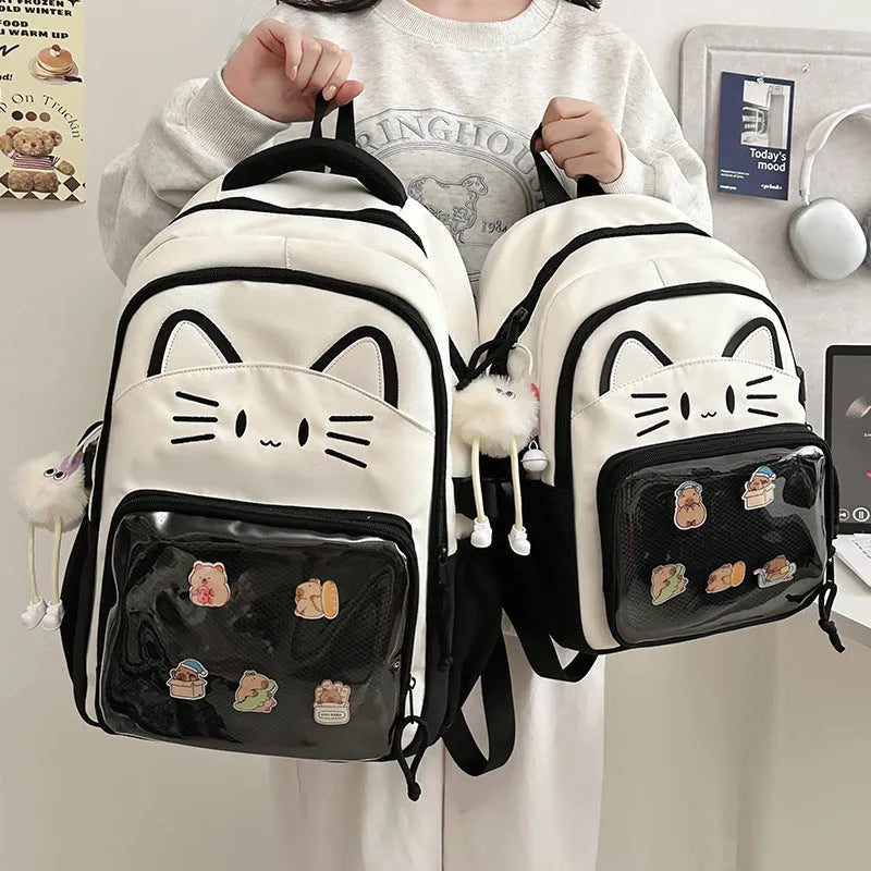 Korean cartoon design backpack with badge pendant in multiple colour options showing large capacity and curved shoulder straps