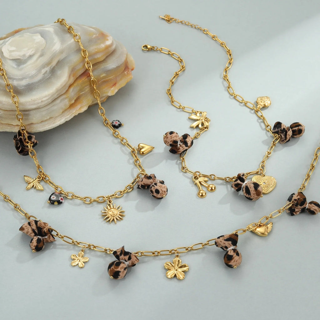 Women's stainless steel leopard pendant necklace with love heart flowers design on adjustable 41-50cm chain