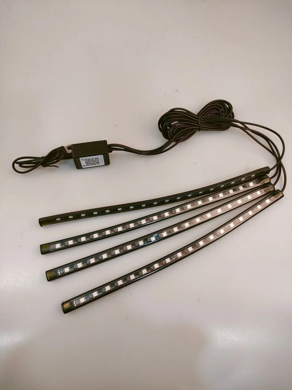 Car interior footwell LED atmosphere lighting kit with 36 lights and controller showing eight colour options