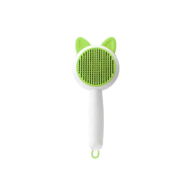 Self-cleaning cat grooming brush with stainless steel bristles in greenish white and orange white colour options