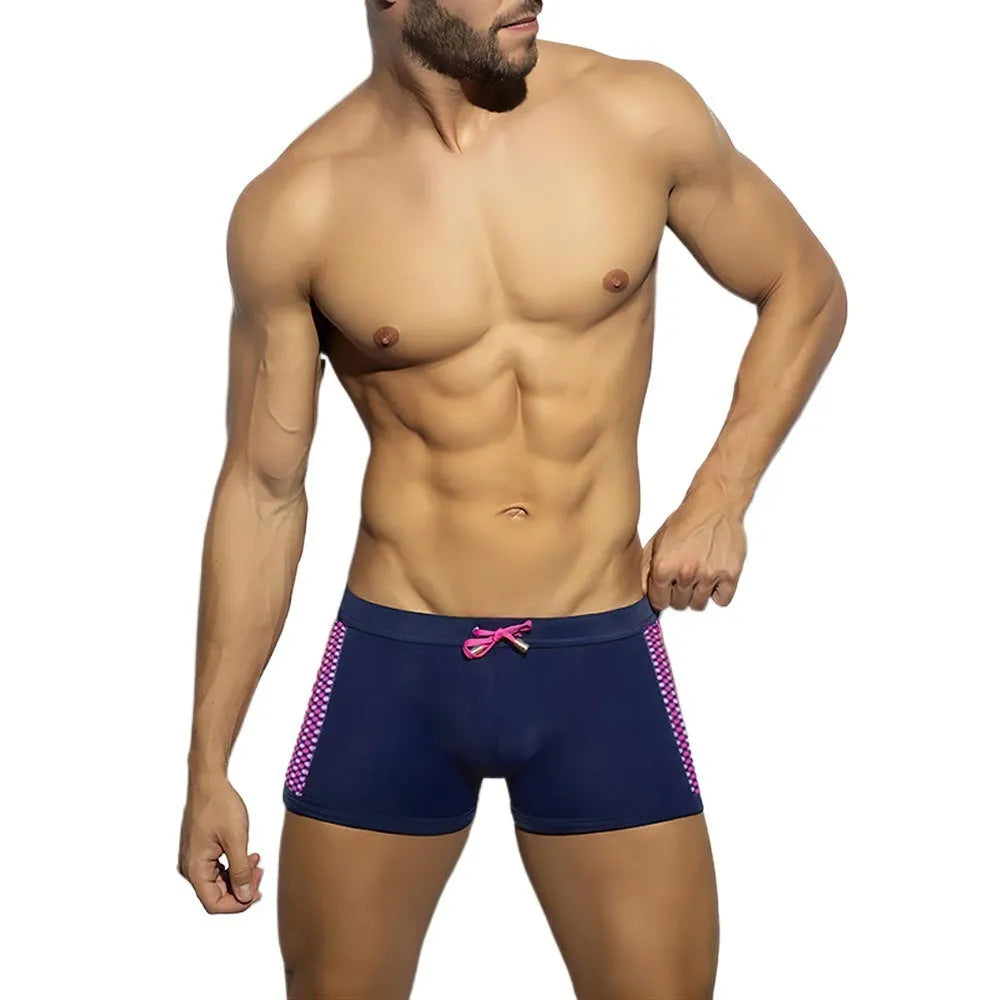 Men's polka dot print quick-dry swimming boxers in yellow, black, and dark blue.