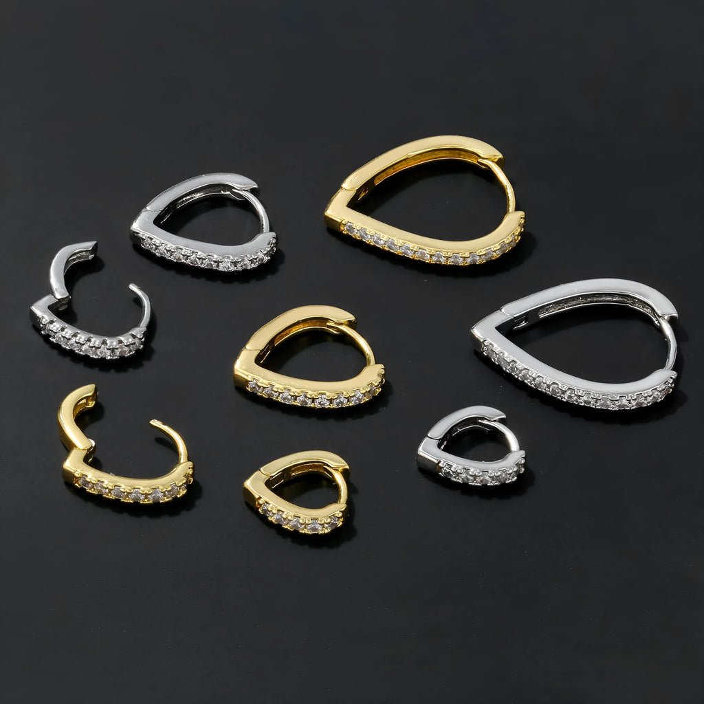 A geometric heart-shaped ear clip for women in electroplated copper, shown in gold and white K colour options.