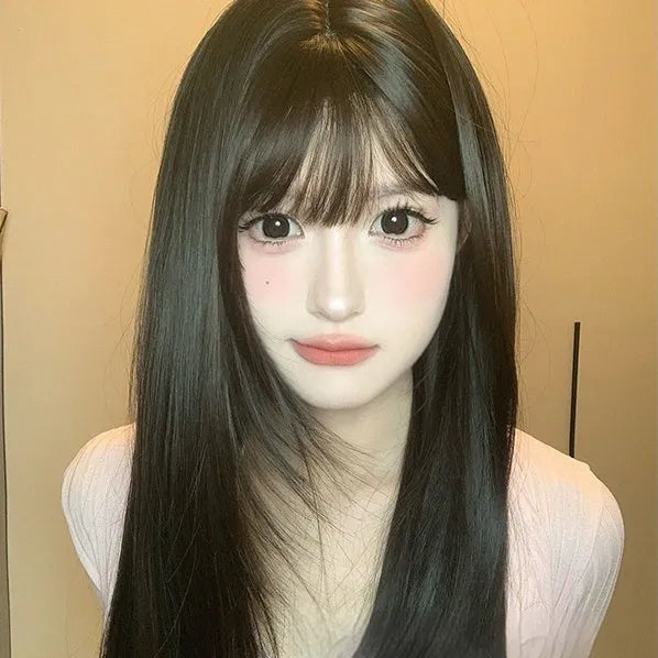 Dark brown long straight synthetic wig with bangs on a wig stand