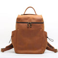 Classic retro backpack in brown Crazy Horse leather with exposed stitching and metal buckles