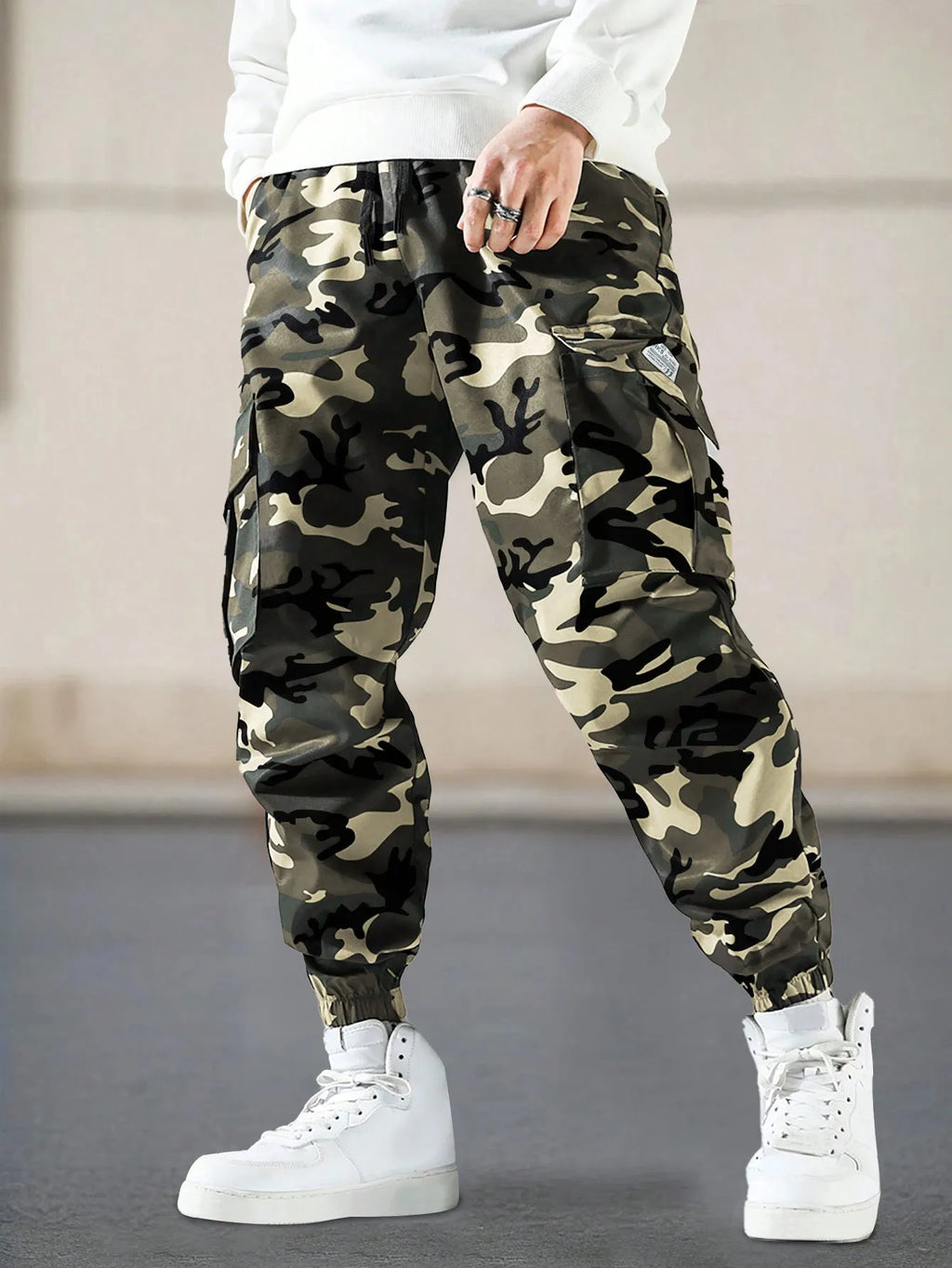 Men's camouflage drawstring work trousers with side pockets in casual regular fit polyester blend