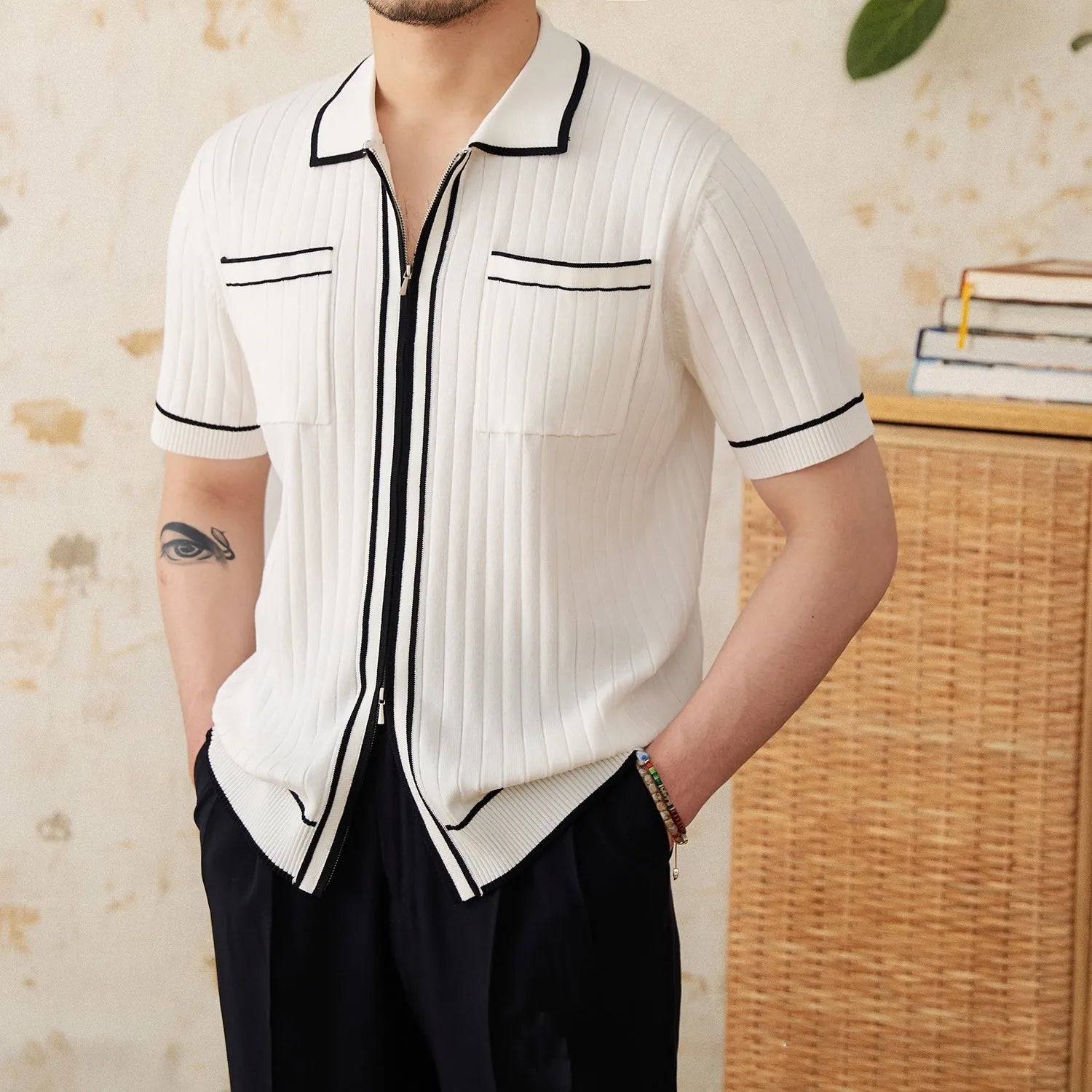 Slim black elastic lapel polo shirt with short sleeves on a mannequin.