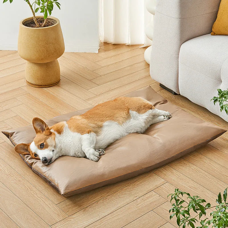 Blue cooling pet bed for cat or small dog showing lightweight foam construction and size scale.