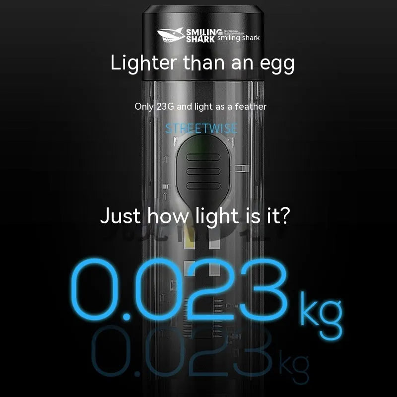 Black plastic portable flashlight with USB charging port.