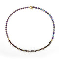 Purple amethyst and garnet stone bead bracelet with geometric design and manual craft details