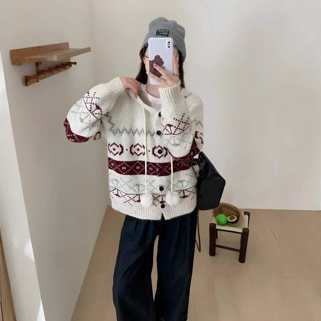 Geometric patterned acrylic brocade sweater coat in grey, loose fit with long sleeves.