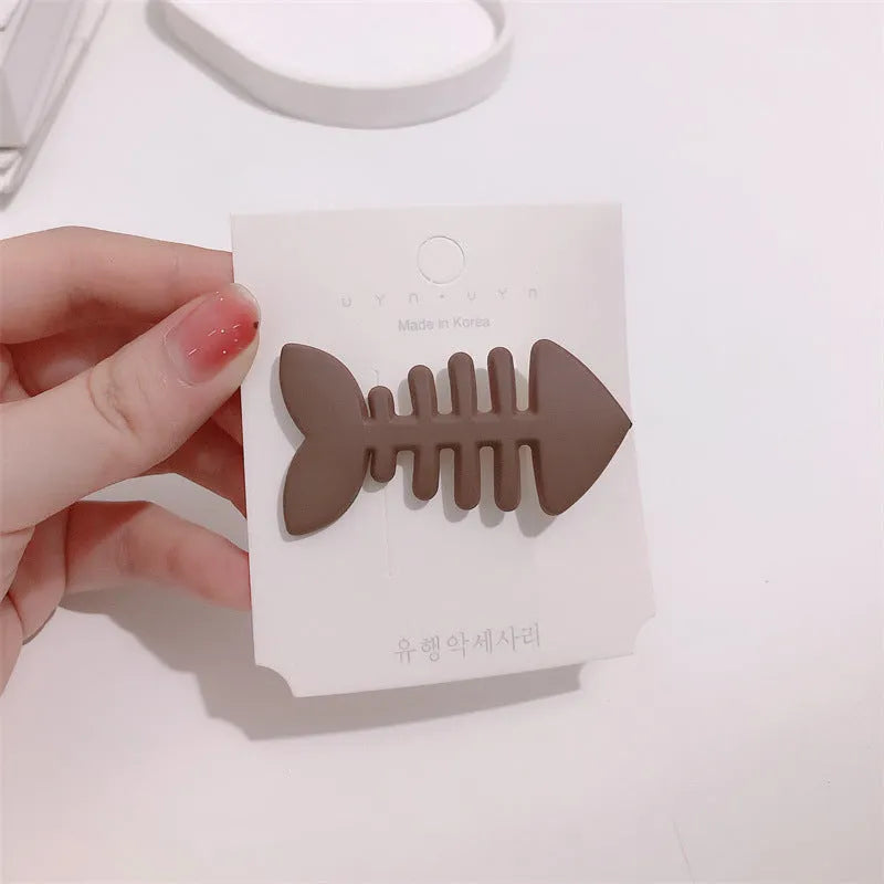 Minimalist fishbone pattern hair barrette with duckbill clip in a candy colour.
