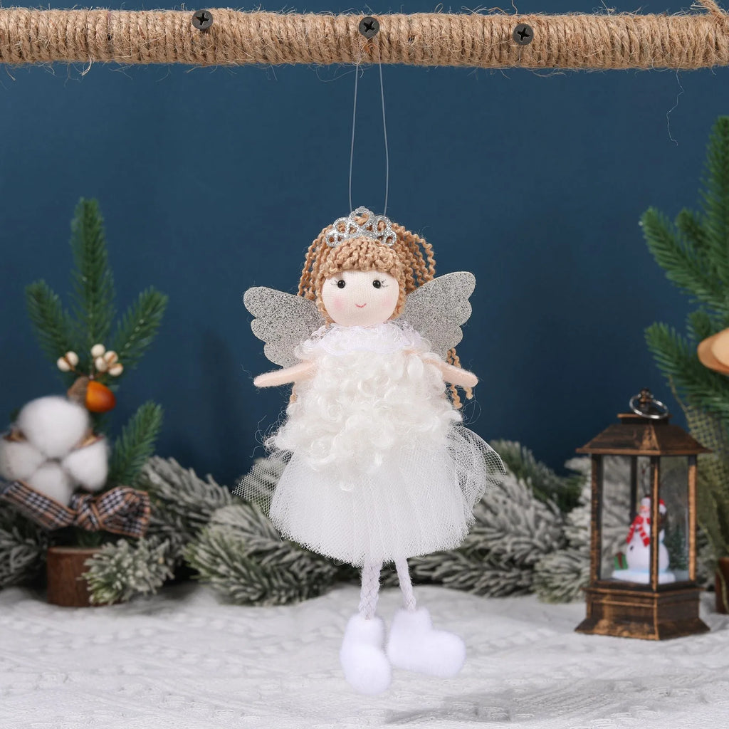 Close-up of a girl's cloth Christmas angel hair pendant clip in white, shown on a high ponytail.