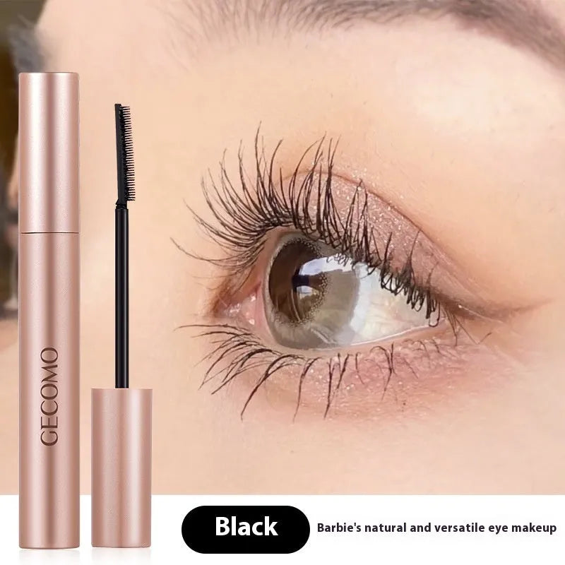 Black mascara in 14cm long tube with curved brush applicator for natural curly lashes