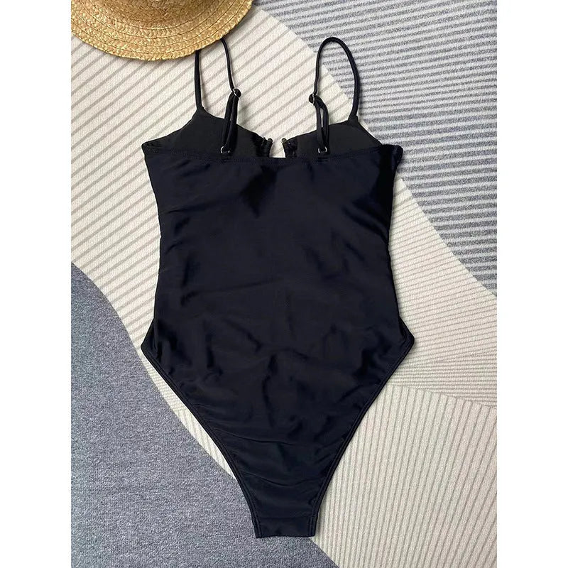 Black women's one-piece swimsuit on mannequin showing front design