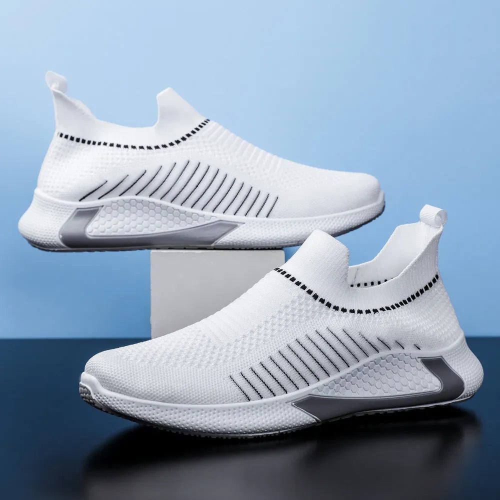 Men's black and white striped mesh slip-on sneakers with flyknit upper and lace-up front