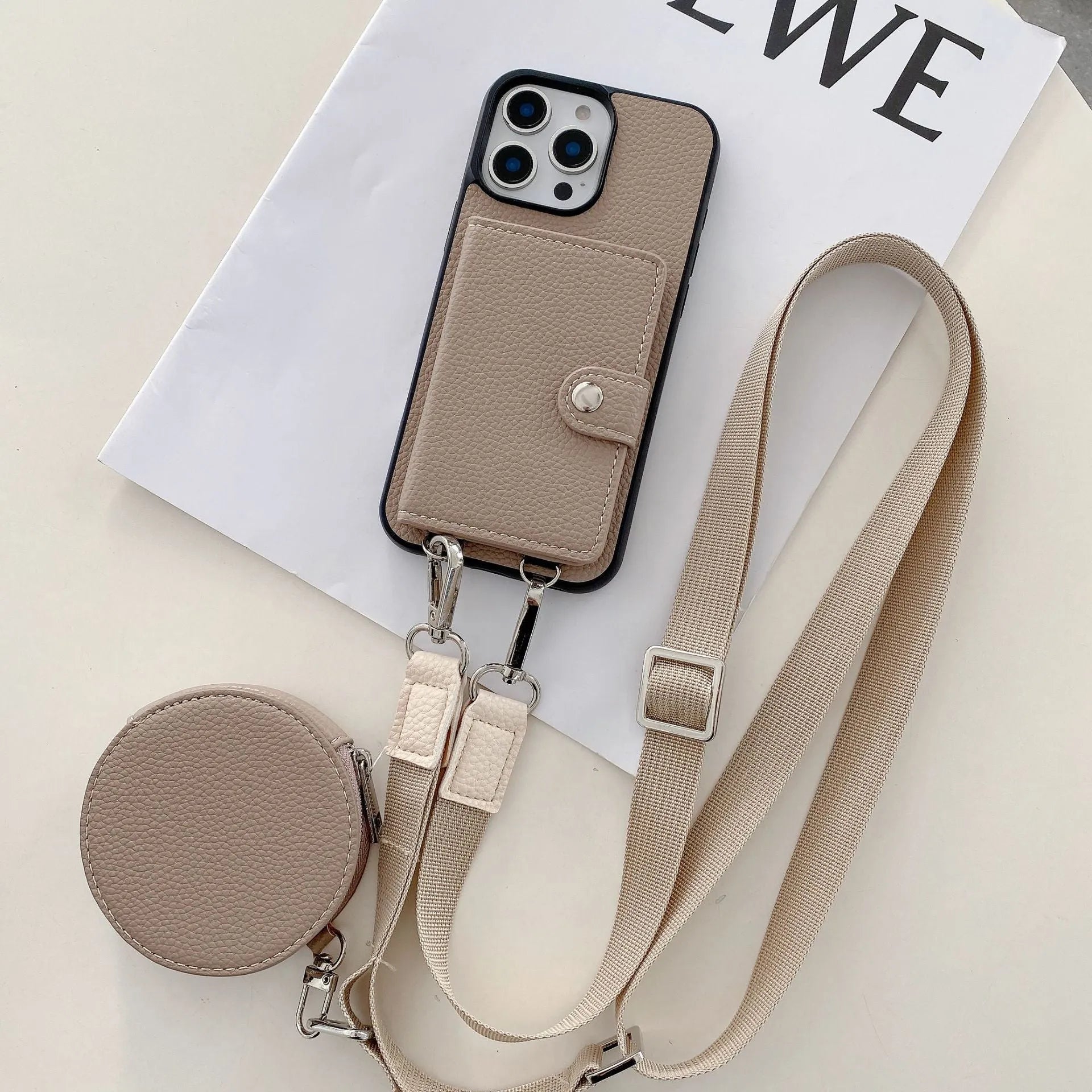 Black card holder lanyard phone case for iPhone showing integrated card slots on back and adjustable neck strap.