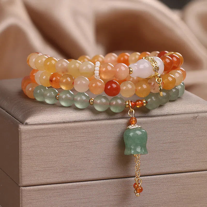 Multi-layer Jinsi Jade beaded bracelet with three circles and lily motif, ethnic style women's jewellery