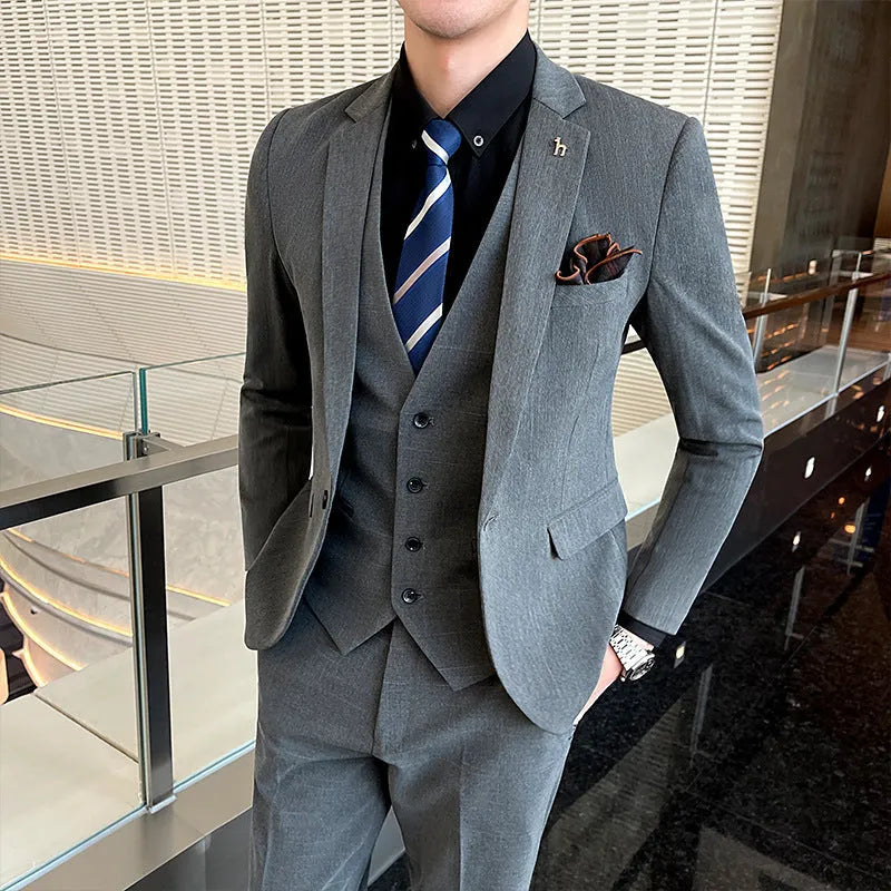 Slim fit British style suit for men in black or dark grey business formal wear