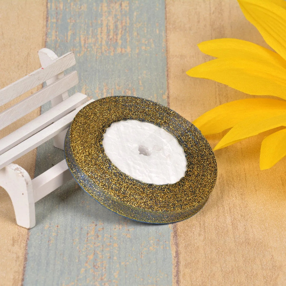 Colourful green onion pattern polyester ribbon spool with metallic gold or silver wire detailing.