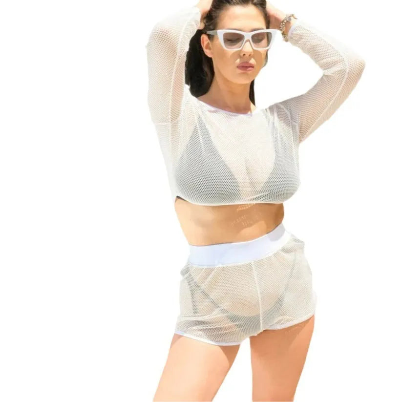 White transparent women's beach swimsuit top and skirt set on a model.