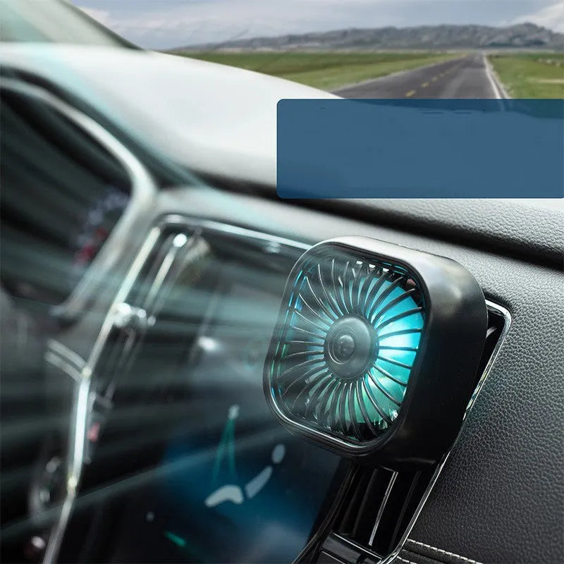 Small black USB car fan with three-speed keyboard controls on compact base