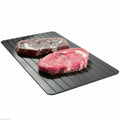 Black rectangular aluminium fast defrost tray for thawing frozen meat and fish