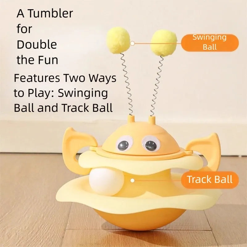 Cat toy tower with rotating bee toy and three-layer trackball in green plastic, placed on a wooden floor