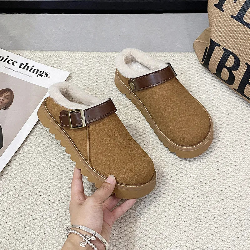 Women's brown suede snow boots with plush lining and rubber sole