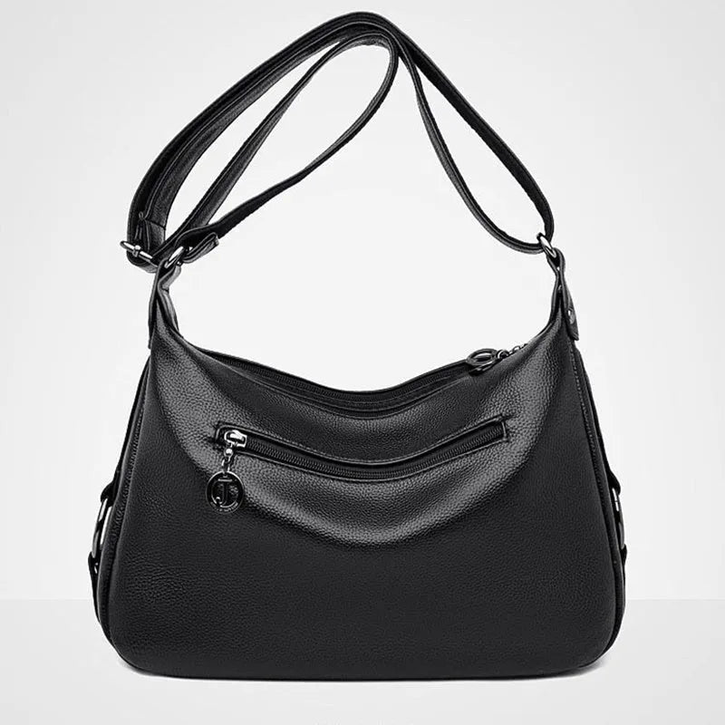 Large black women's crossbody shoulder bag with multiple internal compartments and zip closure