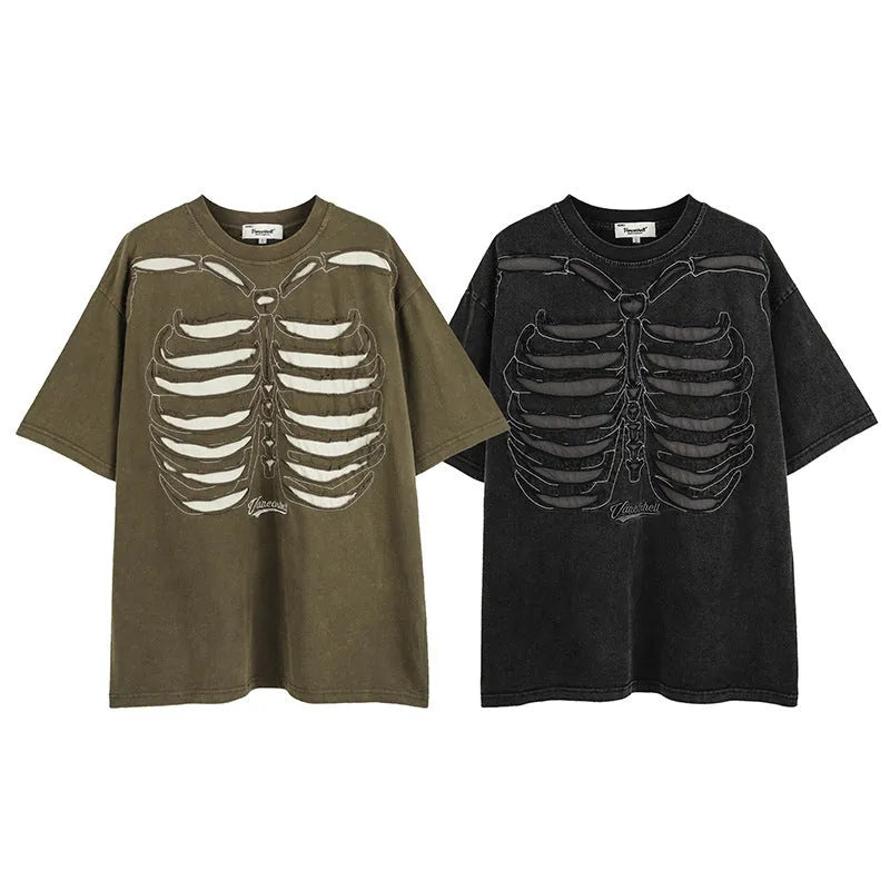 Man's loose brown t-shirt with a large black skull and letter graphic print on the front, featuring drop-shoulder sleeves.