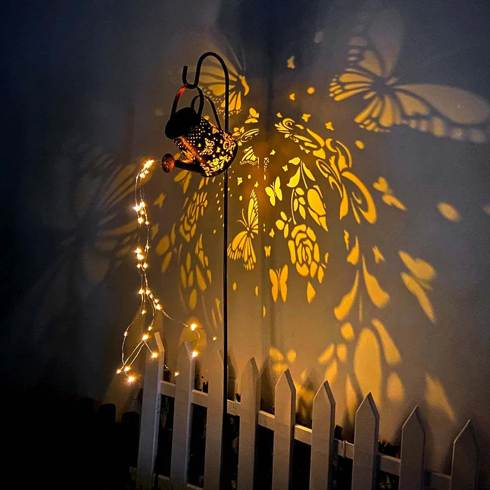 Solar garden lamp with iron butterfly pattern and tapered design in warm white