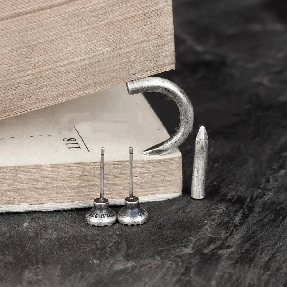 S925 sterling silver punk stud earring in straight and curved retro nail designs.
