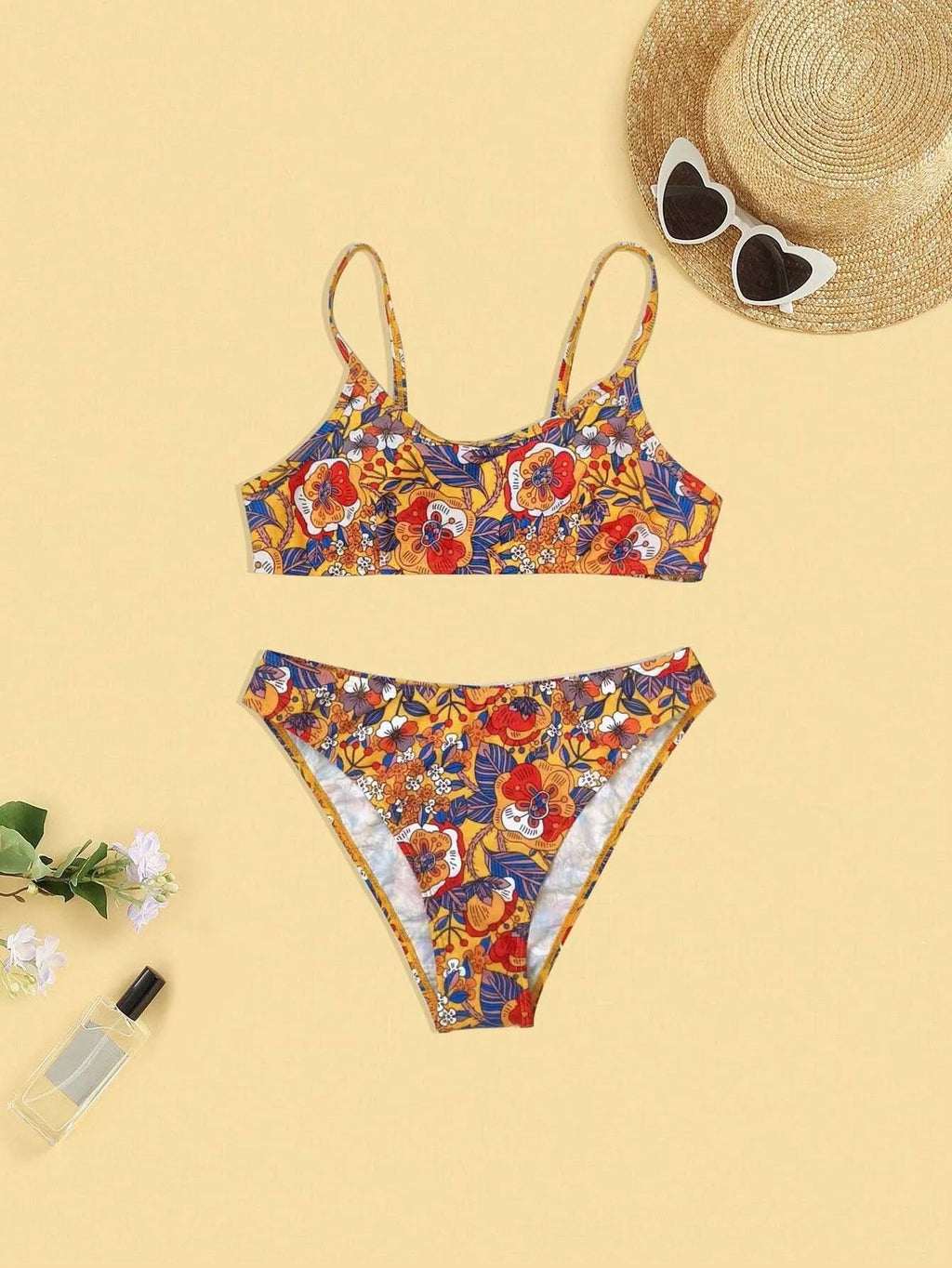 Plus size floral print women's bikini swimsuit with adjustable straps.