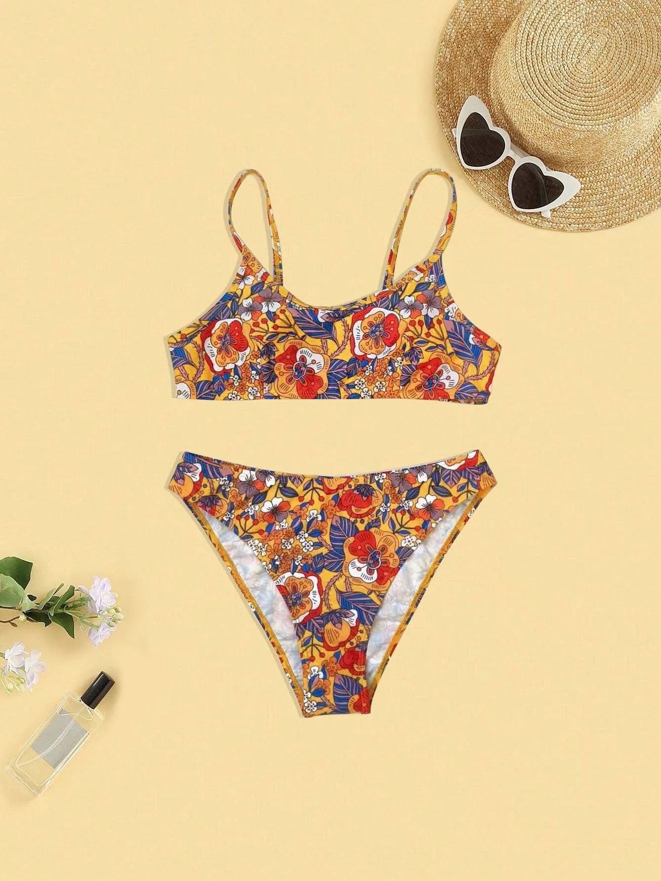 Plus size floral print women's bikini swimsuit with adjustable straps.