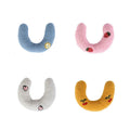 Soft quilted U-shaped cat pillow in blue, 26x18cm, on a clean white background