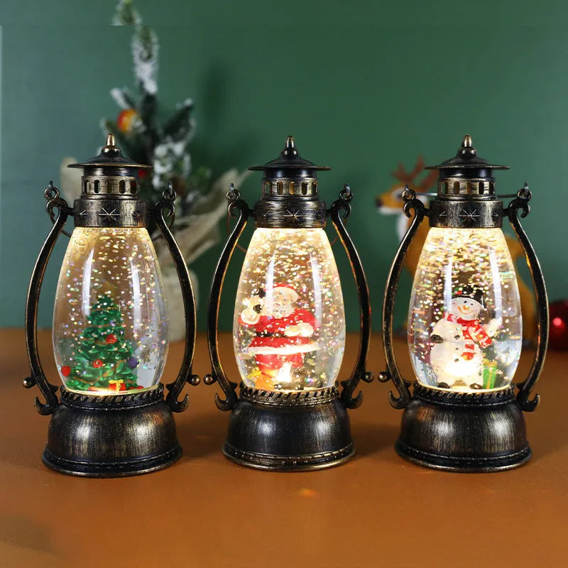 Clear plastic crystal ball LED portable oil lamp with a decorative snowman figure inside on a table.